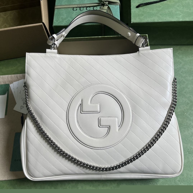 G*u*i top handle bags